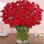 خرید 100 رز قرمز جذاب در گلدان شیشه ای (امارات)