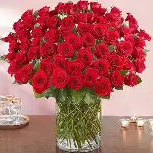خرید 100 رز قرمز جذاب در گلدان شیشه ای (امارات)