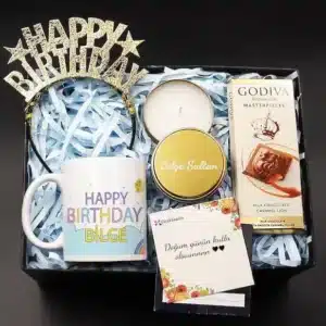 لیوان تبریک تولد و تاج تولدت مبارک و شمع جعبه فلزی طلایی و ست هدیه شکلاتی گودیوا