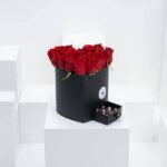 خرید 25 گل رز قرمز با 10 عدد شکلات کاراملی (بحرین)